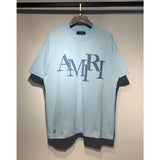 amri flow paint graffiti letter starry sky classic logo print short sleeve couple t-shirt