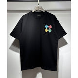amri flow paint graffiti letter starry sky classic logo print short sleeve couple t-shirt
