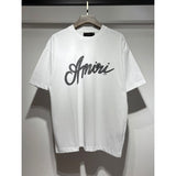 amri flow paint graffiti letter starry sky classic logo print short sleeve couple t-shirt
