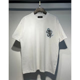 [gram] am flow paint graffiti letter starry sky classic logo print short sleeve couple t-shirt